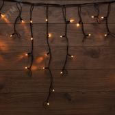 Гирлянда Айсикл Бахрома светодиодная 3,2х0,6 м, с эффектом мерцания, 88 LED, черный провод каучук, теплое белое свечение - артикул 255-326