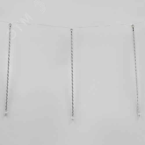 ULD-E1505-336/DTK BLUE IP44 TWISTED METEOR Занавес светодиодный фигурный «Звездный дождь», соединяемый. 6 подвесов. 336 светодиодов. Размер 1,5х0,5м. Цвет свечения синий. IP44. Провод прозрачный. Упаковка картон. (UL-00000167) 2