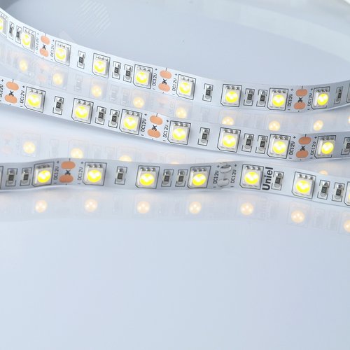 Лента гибкая светодиодная на самоклеящейся основе. ULS-M25-5050-60LED/m-10мм-IP20-DC12V-14,4W/m-5м-3000K PROFI Катушка 5м. в герметичной упаковке. Теплый (3000К) - UNIEL