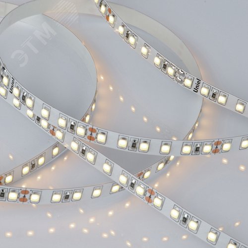 Лента гибкая светодиодная на самоклеящейся основе. ULS-2835-120LED/m-8мм-IP20-DC24V-9,6W/m-5м-3000K Катушка 5 м. в герметичной упаковке. (3000K) 4